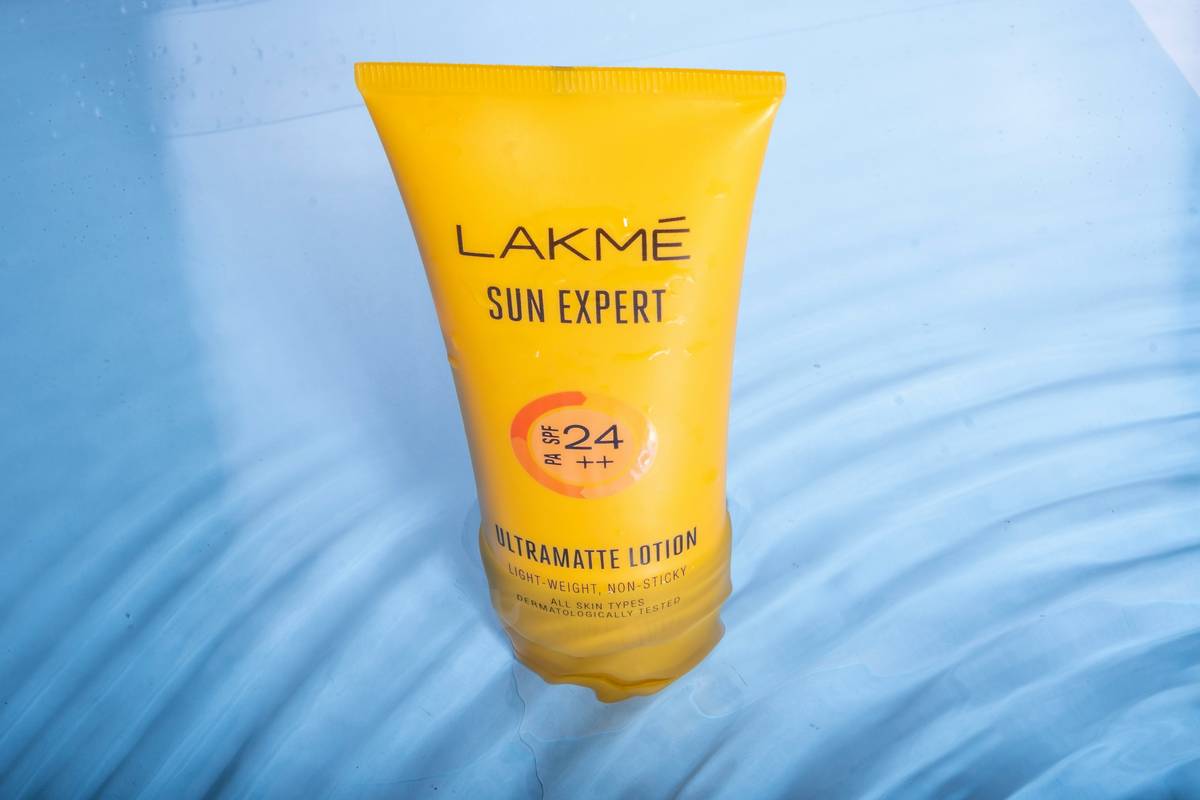 Close-up of sun and earth sunscreen bottle with non-nano zinc oxide label highlighted